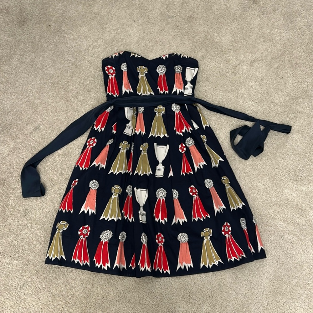 Anthropologie size 4 strapless dress dark blue w/ ribbon detail.